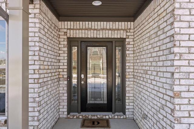 foyer entrance with light wood-type flooring