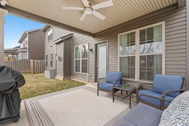 view of patio with area for grilling, an outdoor hangout area, and ceiling fan