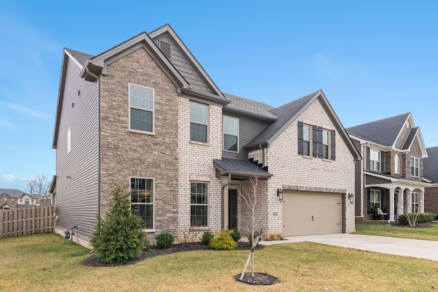 view of front of house featuring a garage and a front yard