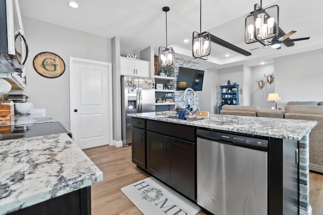 288 Liam Way, Paint Lick, KY 40461 - kitchen with a sink, stainless steel appliances, ceiling fan with notable chandelier, and light wood-style flooring