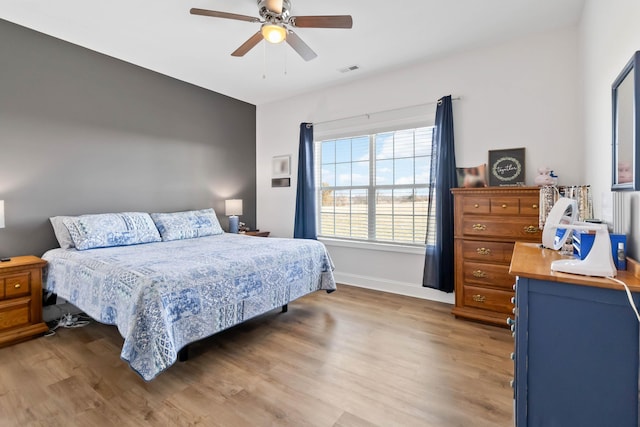 288 Liam Way, Paint Lick, KY 40461 - bedroom with visible vents, wood finished floors, baseboards, and ceiling fan