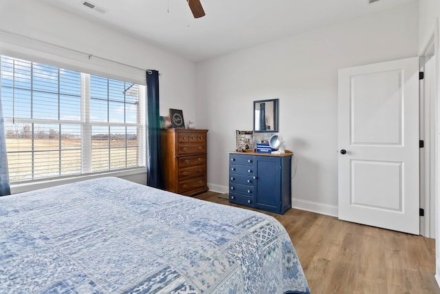 288 Liam Way, Paint Lick, KY 40461 - bedroom with ceiling fan, baseboards, visible vents, and wood finished floors