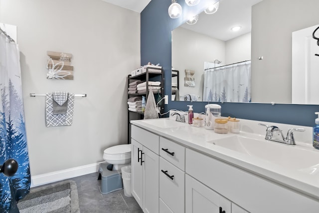 288 Liam Way, Paint Lick, KY 40461 - bathroom with a sink, double vanity, toilet, and baseboards