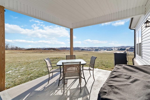 288 Liam Way, Paint Lick, KY 40461 - view of patio with a rural view and outdoor dining area