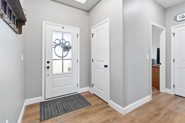 288 Liam Way, Paint Lick, KY 40461 - foyer entrance with light wood-style floors and baseboards