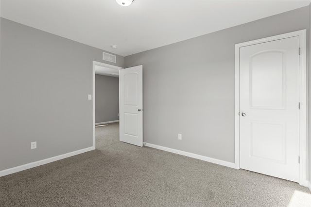 unfurnished bedroom featuring carpet floors