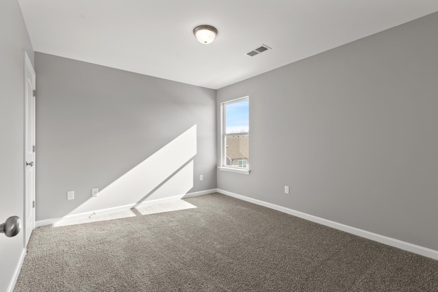 empty room featuring carpet floors