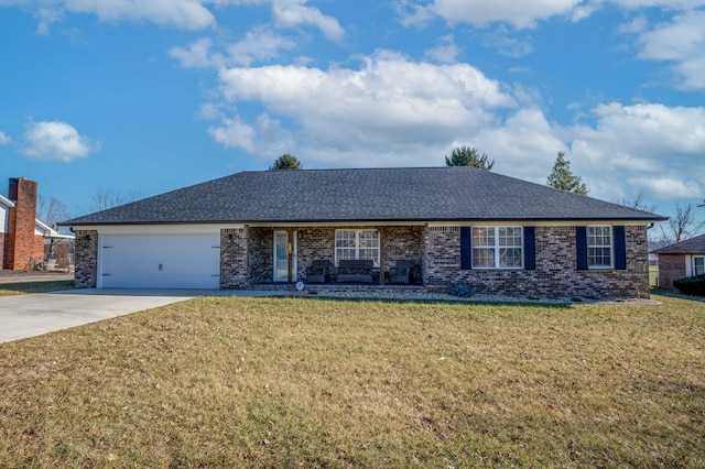 single story home with a garage and a front lawn