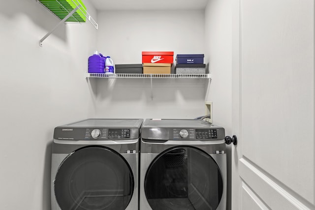 laundry area featuring washer and clothes dryer