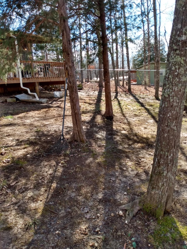 view of yard with a wooden deck