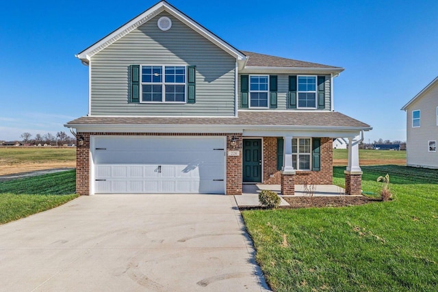 view of front of property featuring a garage, covered porch, and a front yard