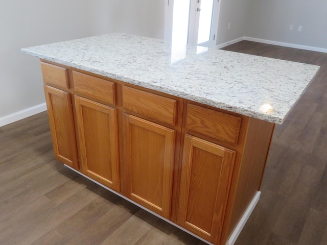 interior details featuring hardwood / wood-style flooring