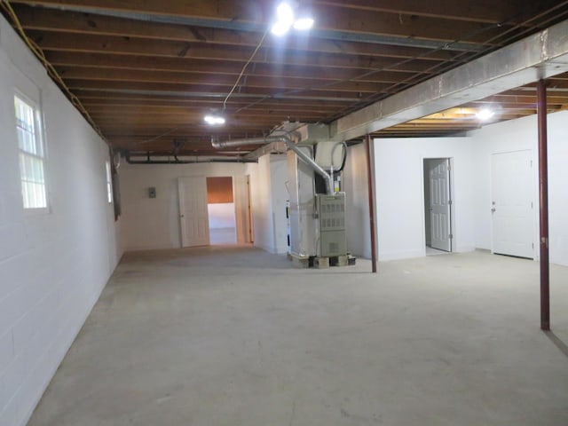 basement featuring heating unit