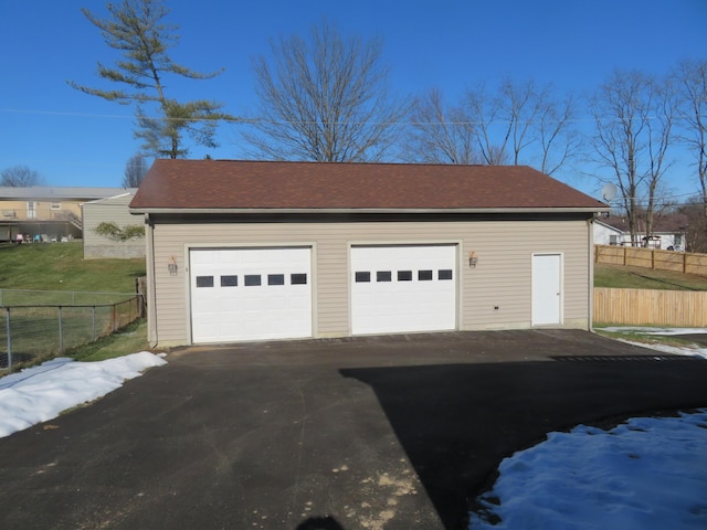 view of snow covered garage