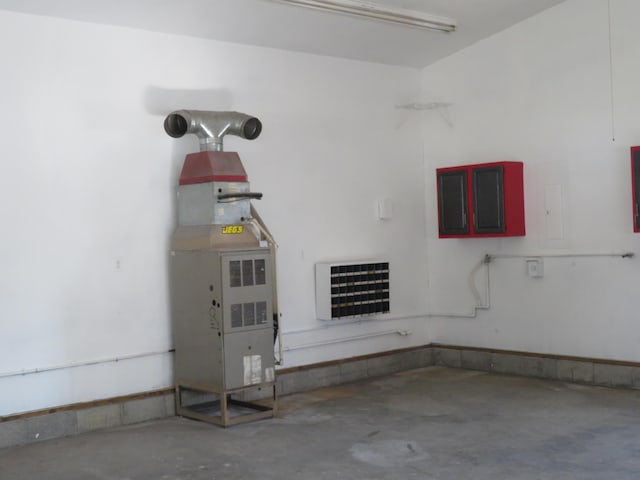 garage featuring heating unit