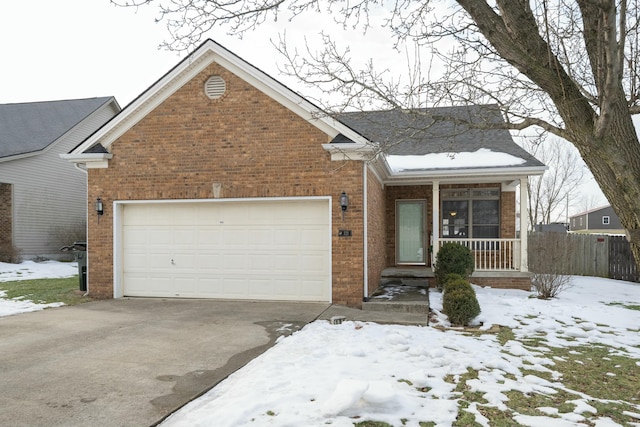 view of front of home featuring a porch and a garage