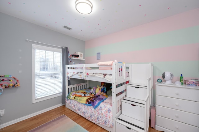 bedroom featuring light hardwood / wood-style floors