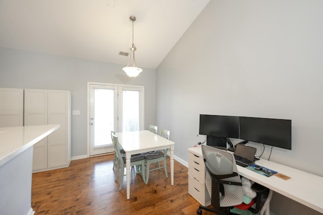 office space featuring lofted ceiling and wood-type flooring