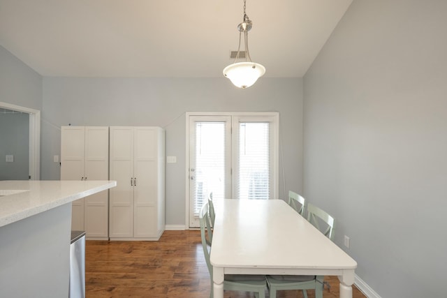 dining room featuring dark hardwood / wood-style floors