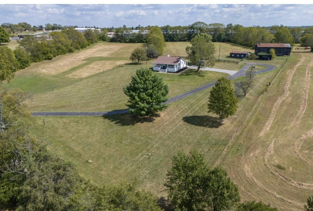 birds eye view of property featuring a rural view