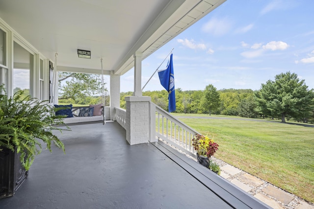 balcony featuring covered porch