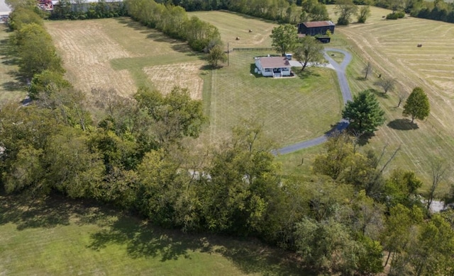 birds eye view of property featuring a rural view