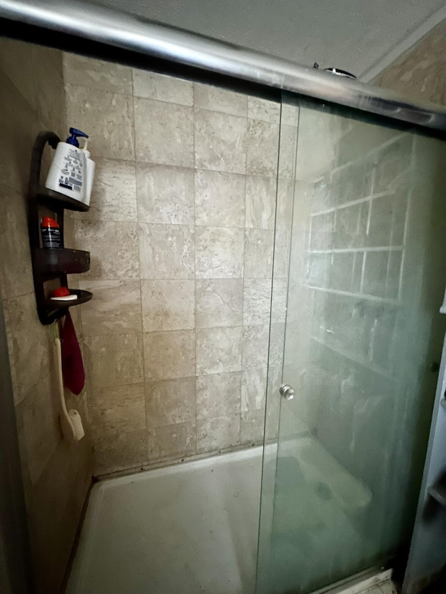 bathroom with an enclosed shower