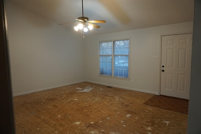 spare room with ceiling fan