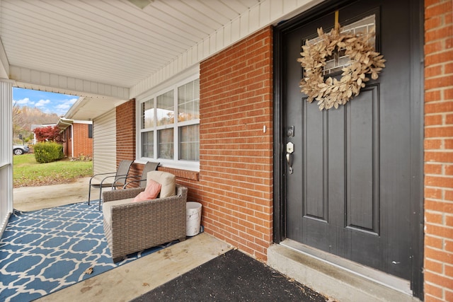 doorway to property featuring a porch