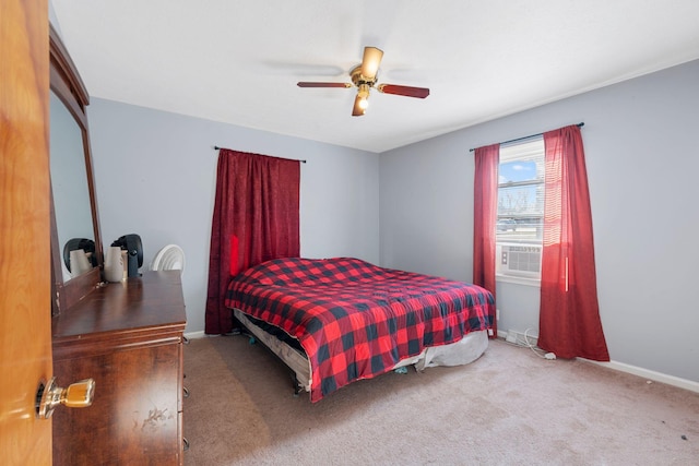 carpeted bedroom with cooling unit and ceiling fan