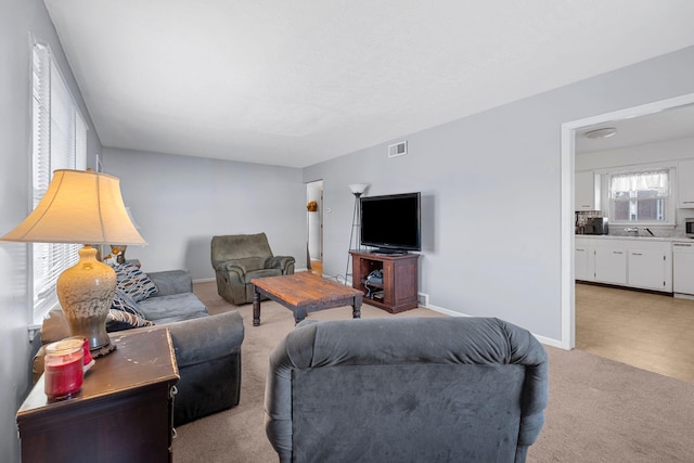 living room with light carpet