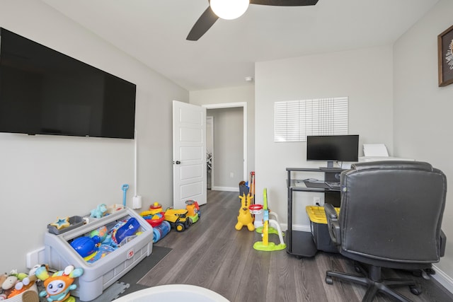 home office featuring ceiling fan and dark hardwood / wood-style flooring