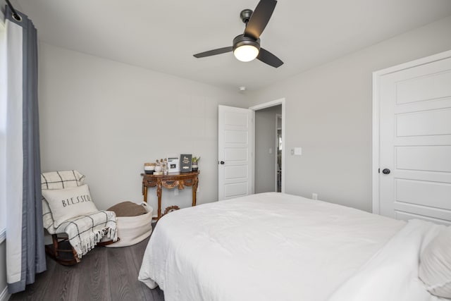 bedroom featuring hardwood / wood-style floors and ceiling fan