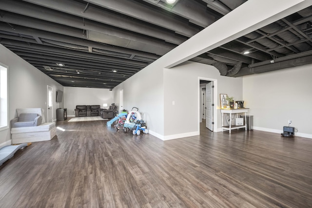 basement featuring dark wood-type flooring