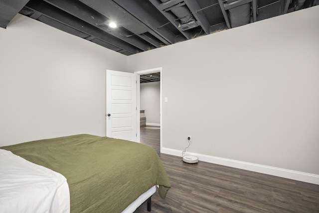 bedroom featuring dark hardwood / wood-style floors