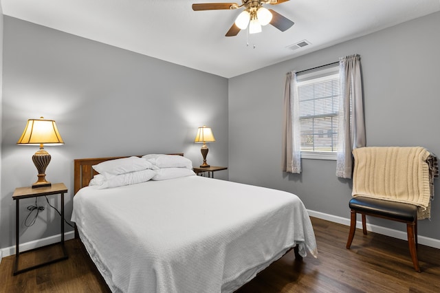 bedroom featuring dark wood-type flooring and ceiling fan