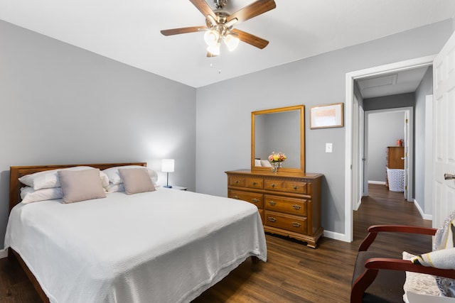 bedroom featuring dark wood-type flooring and ceiling fan