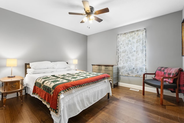 bedroom featuring dark wood-type flooring and ceiling fan