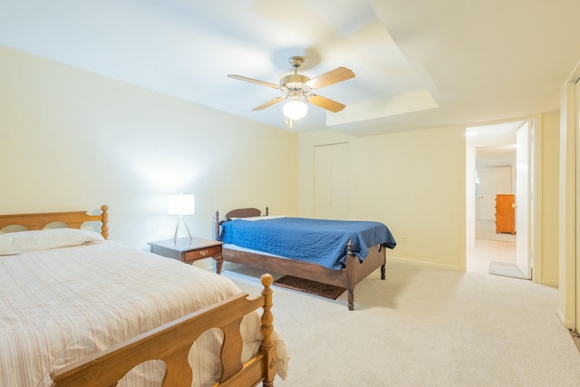 bedroom featuring light carpet, ceiling fan, and billiards