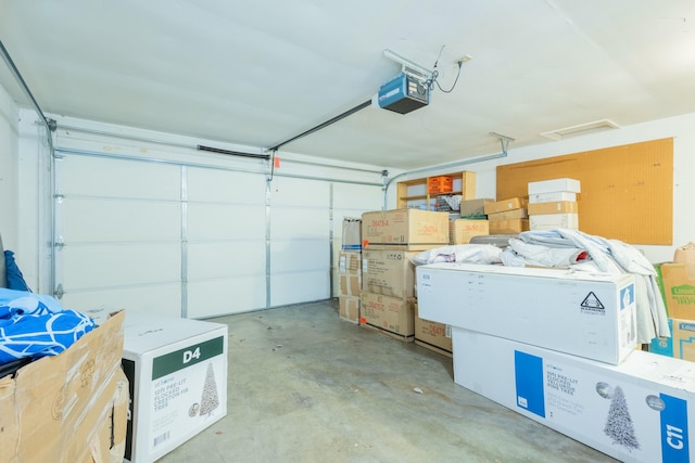 garage featuring a garage door opener