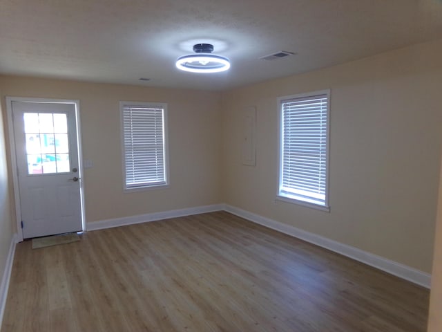 entrance foyer featuring light hardwood / wood-style floors