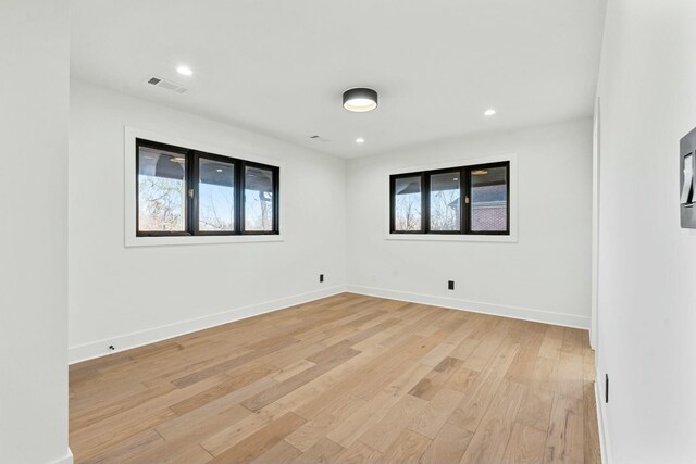 2005 Lakeside Dr, Lexington, KY 40502 - spare room with light wood finished floors, baseboards, and recessed lighting