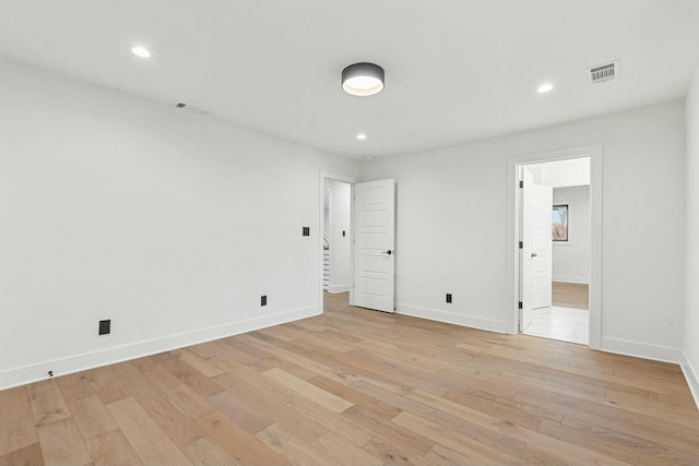 unfurnished bedroom with recessed lighting, visible vents, baseboards, and light wood-style floors