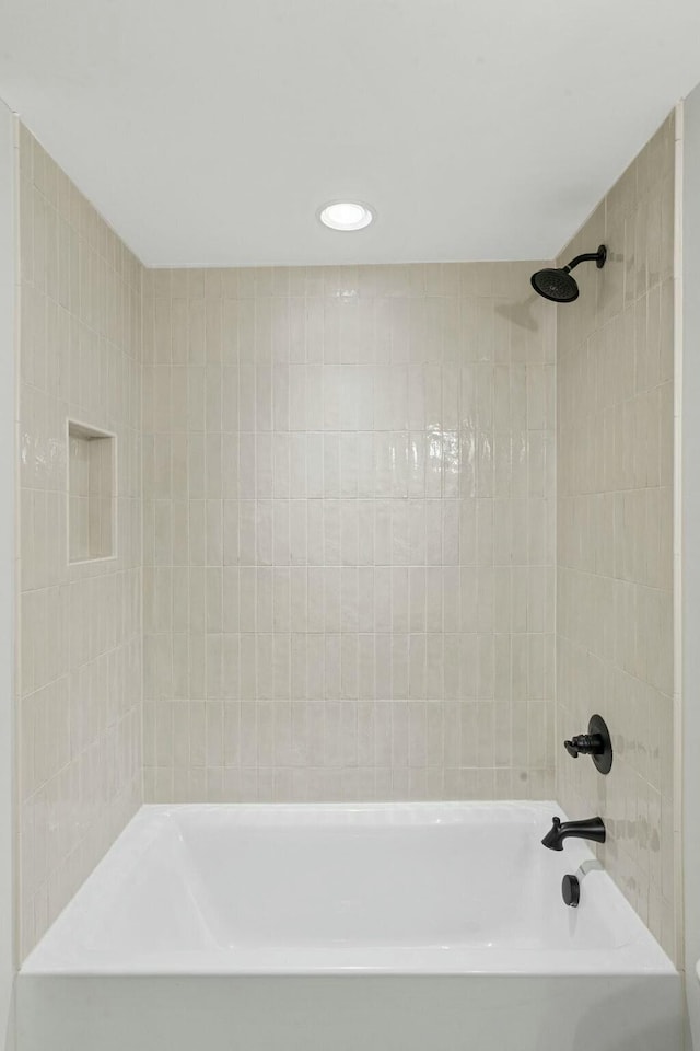 full bath with recessed lighting and shower / washtub combination