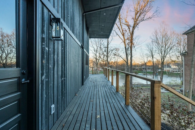 balcony at dusk with a water view