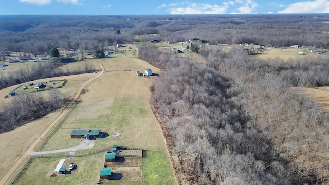 birds eye view of property with a rural view