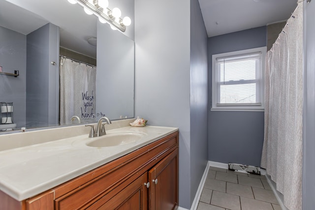 bathroom with vanity and tile patterned floors