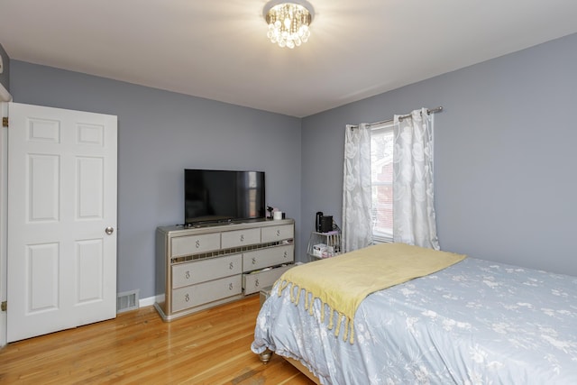 bedroom featuring light wood-type flooring