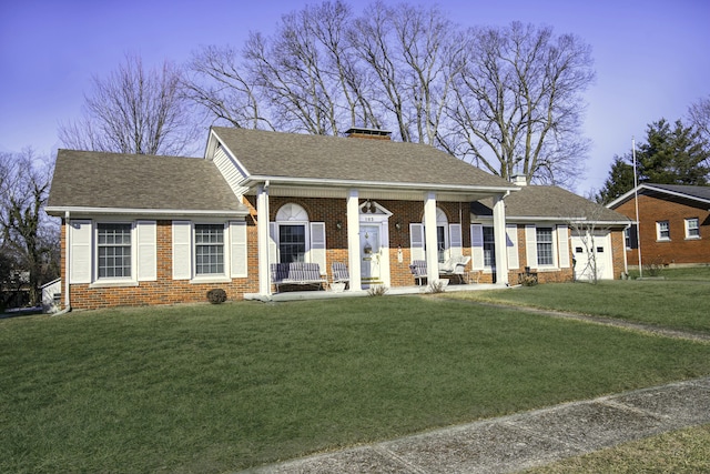 view of front of house featuring covered porch and a front lawn