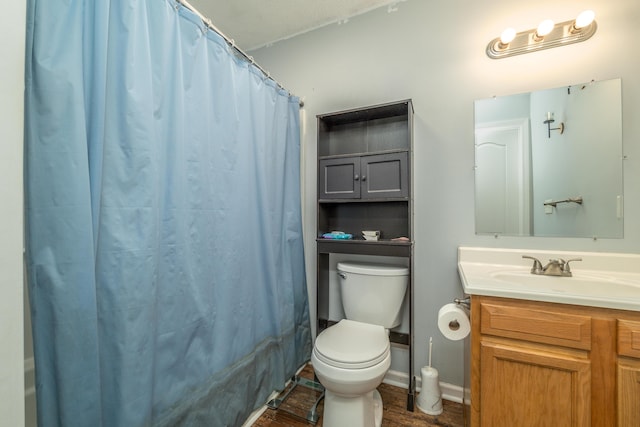 full bathroom featuring vanity, shower / bath combo, and toilet